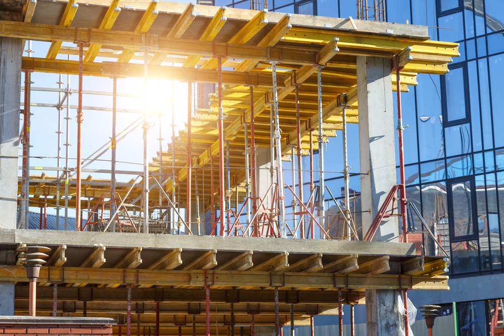 Building,Construction,Site,Work,Against,Blue,Sky.hydraulic,Luffing,Jib,Tower