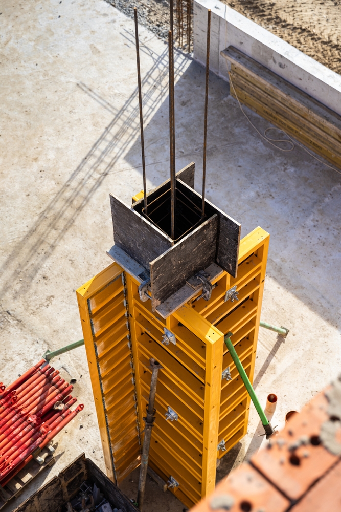 Vertical,Concrete,Formwork,On,Construction,Site,With,Reinforcement,Rods,And