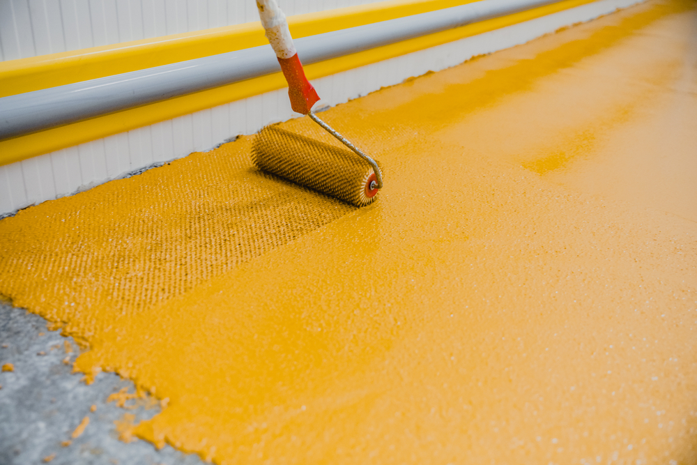 Worker,Applying,Epoxy,And,Polyurethane,Flooring,System.these,Easy-to-clean,Products,Also