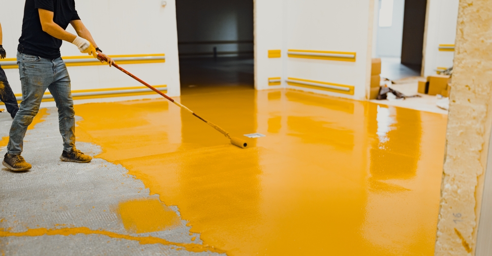 Epoxy,Flooring,Applicator,Performs,Painting,Works,With,Polyurethane,Epoxy,Mortar